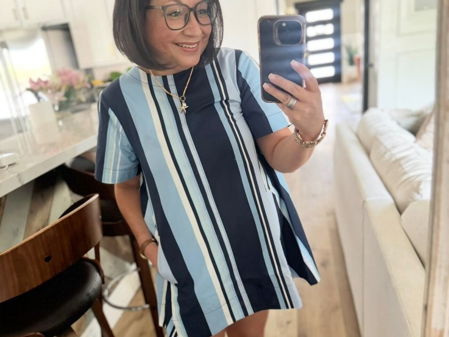 lina wearing blue and white striped dress 