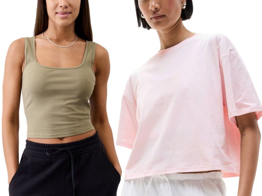 woman wearing olive colored tank and woman wearing pink crop top