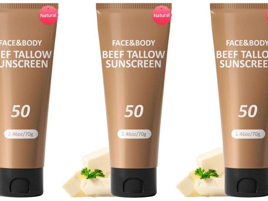 Beef Tallow Sunscreen SPF 50 tube with flowers next to it