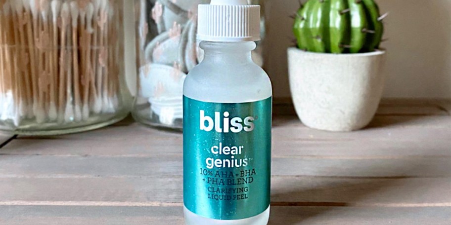 bliss clear genius bottle on table 