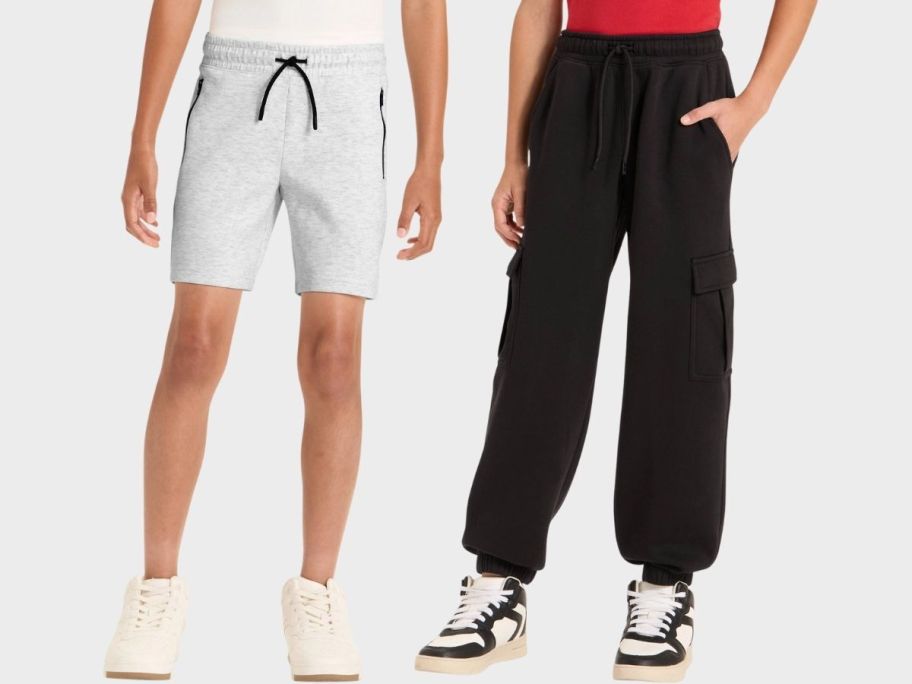 a boy in a pair of shorts and a boy in a pair of joggers
