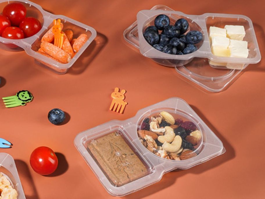 snack containers filled with food on counter
