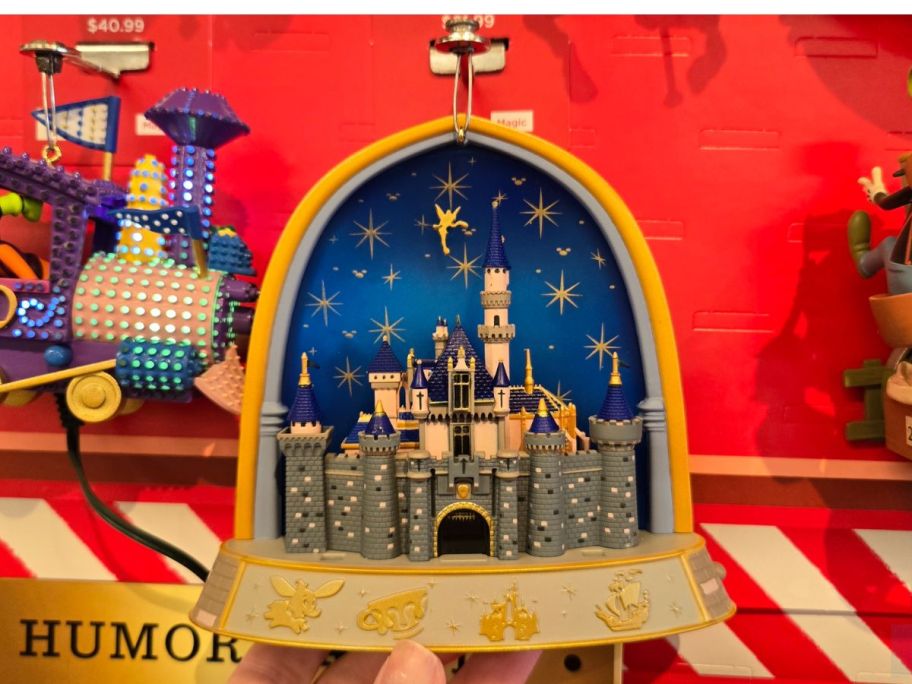 Disney castle ornaments with lights and colors