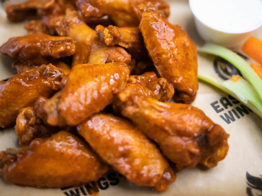 plate of wings with celery and ranch