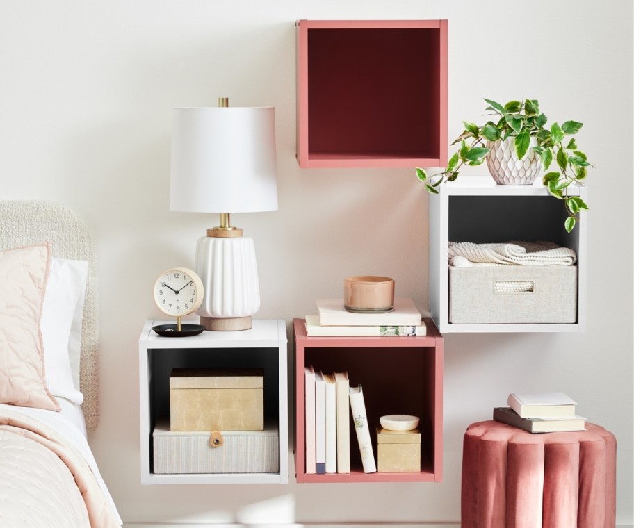 4 floating cube shelves installed on a wall