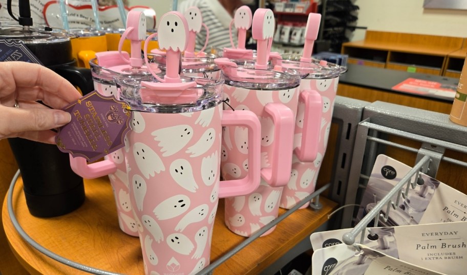 pink ghost graphic 40oz tumblers on display in a store