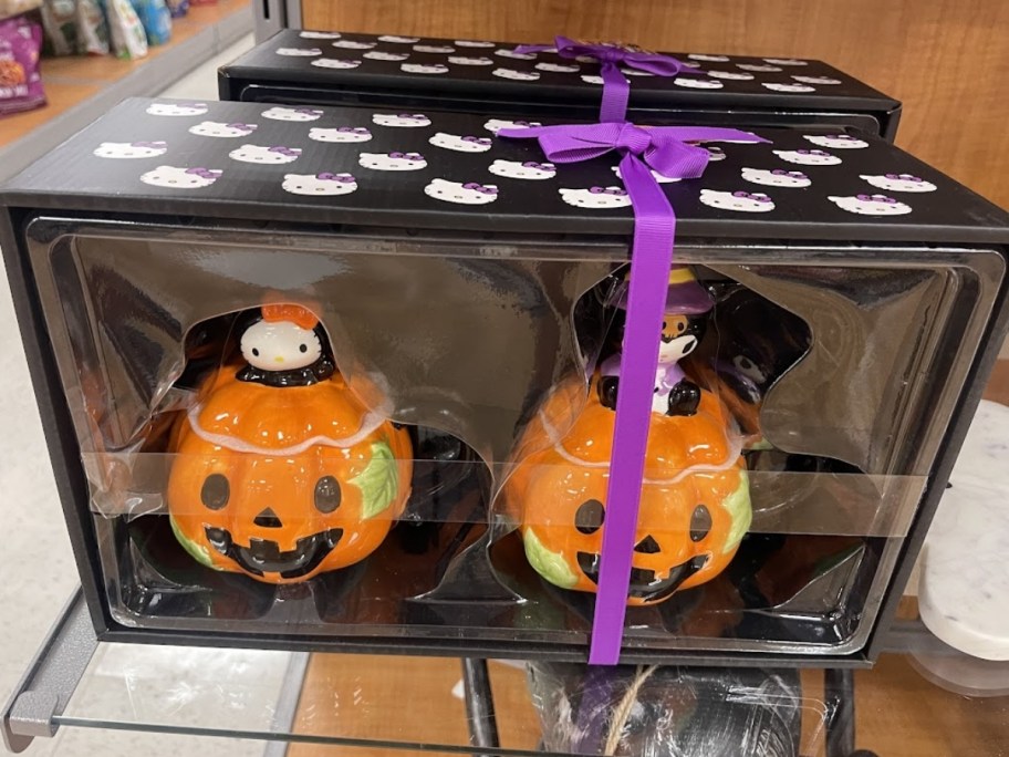two hello kitty halloween decor in a boxed set