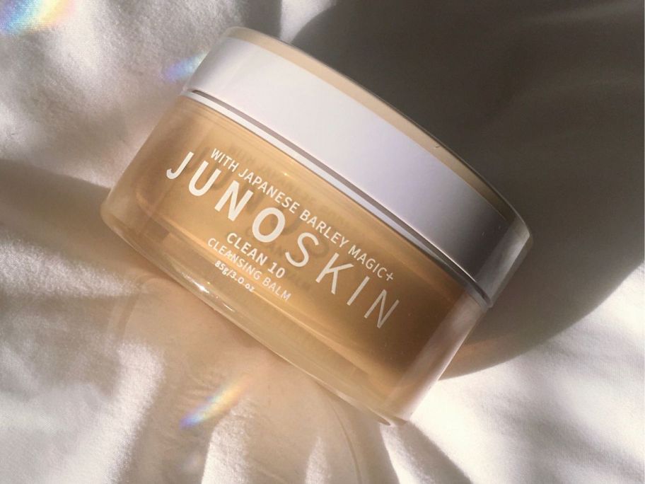 JUNO & Co Clean 10 Cleansing Balm jar on cloth