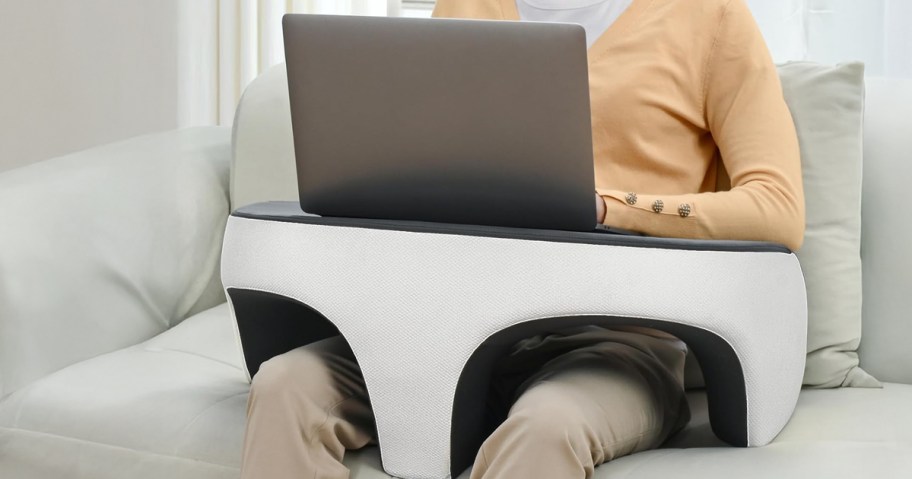 person using a lap desk