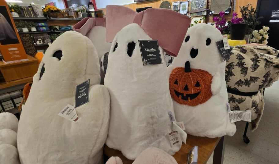 three plush ghosts in a store