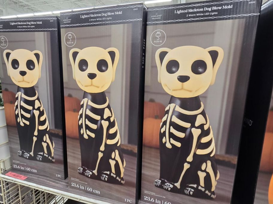 Lighted Skeleton Dog Blow Mold boxes on shelf in store