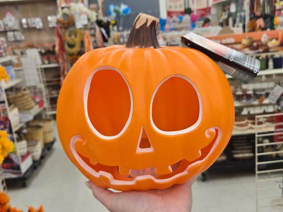 Orange Lighted Jack-o'-Lantern Decor in hand in store