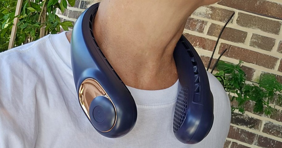 person wearing a blue neck fan