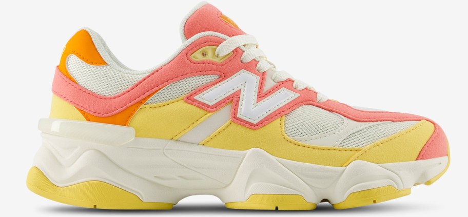 orange and yellow new balance shoe