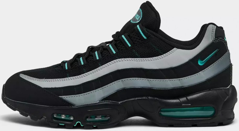 gray, black, and teal nike shoe
