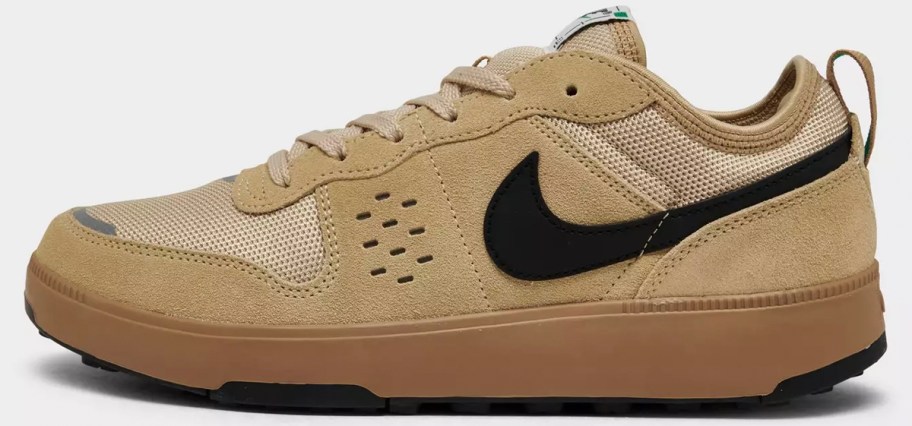tan and black nike shoe