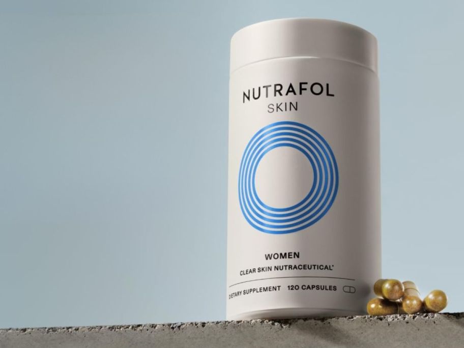 Nutrafol Women's Clear Skin Acne Supplement 120-Count bottle on ledge