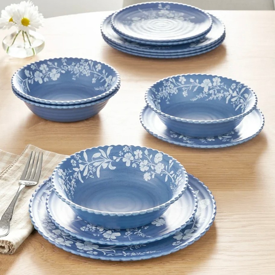 blue floral plates on table