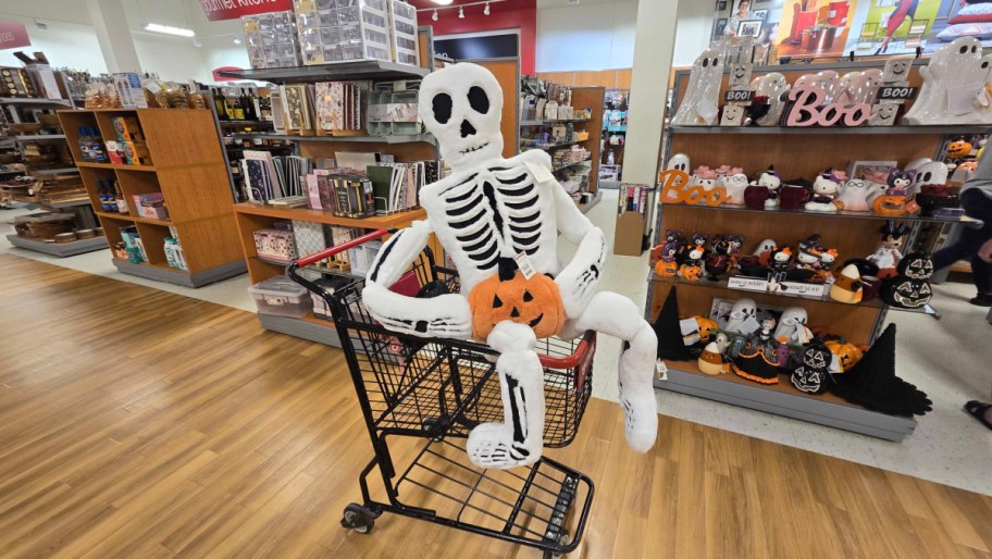 lifesize plush skeleton in a shopping cart