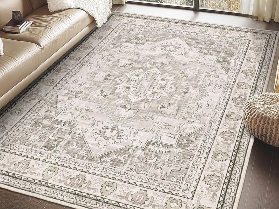 beige printed area rug in living room