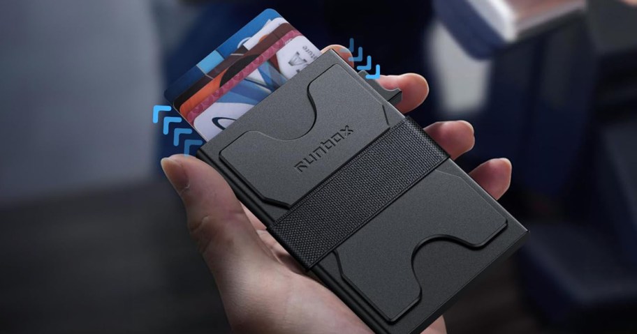 person holding rfid blocking wallet