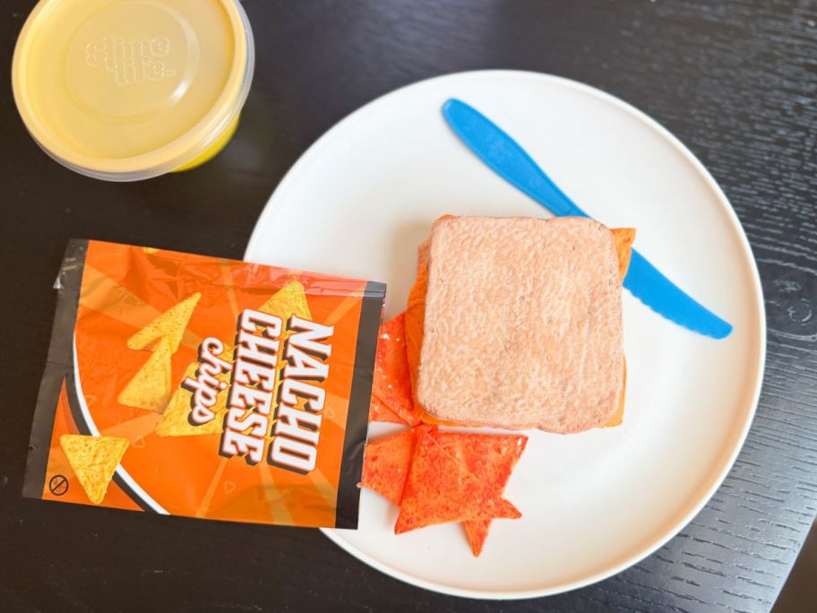 slime life kit sandwich with nacho chips on the siide and queso