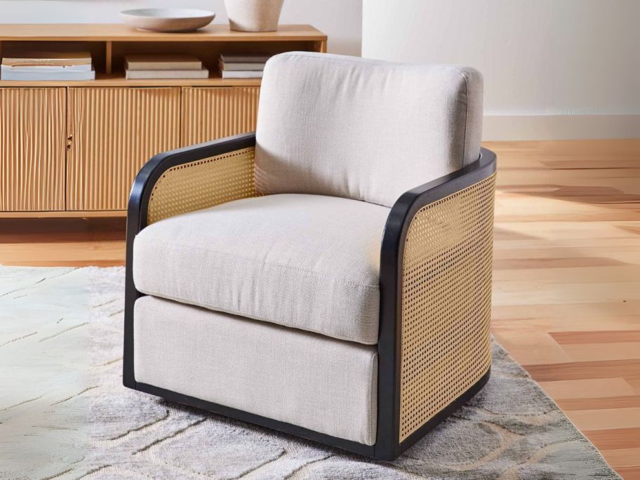 Better Homes & Gardens Springwood Cane Swivel Accent Chair in living room