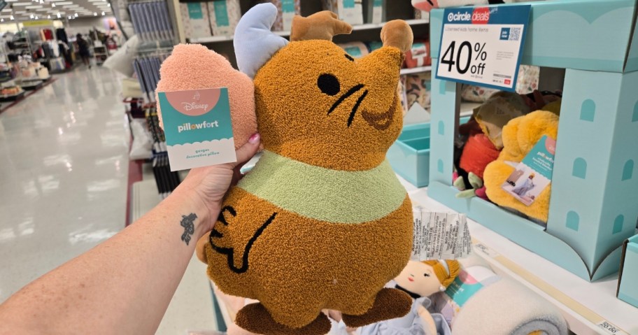 hand holding a Gus the Mouse from Cinderella Throw Pillow