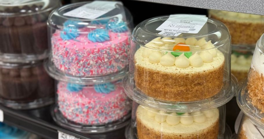 unicorn and carrot cakes in cooler in store