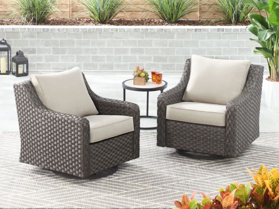 brown and beige Better Homes & Gardens River Oaks 2-Piece Outdoor Swivel Gliders on patio
